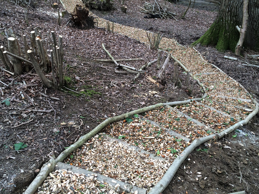 Steps finished off with wood and bark chippings.